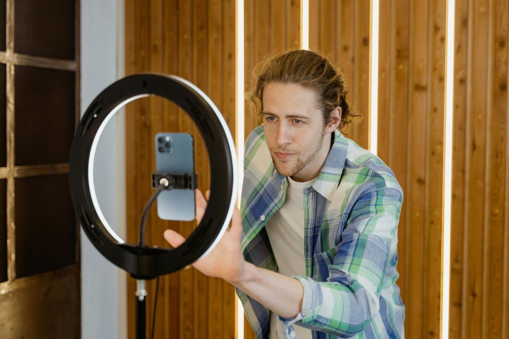 man creating social media content